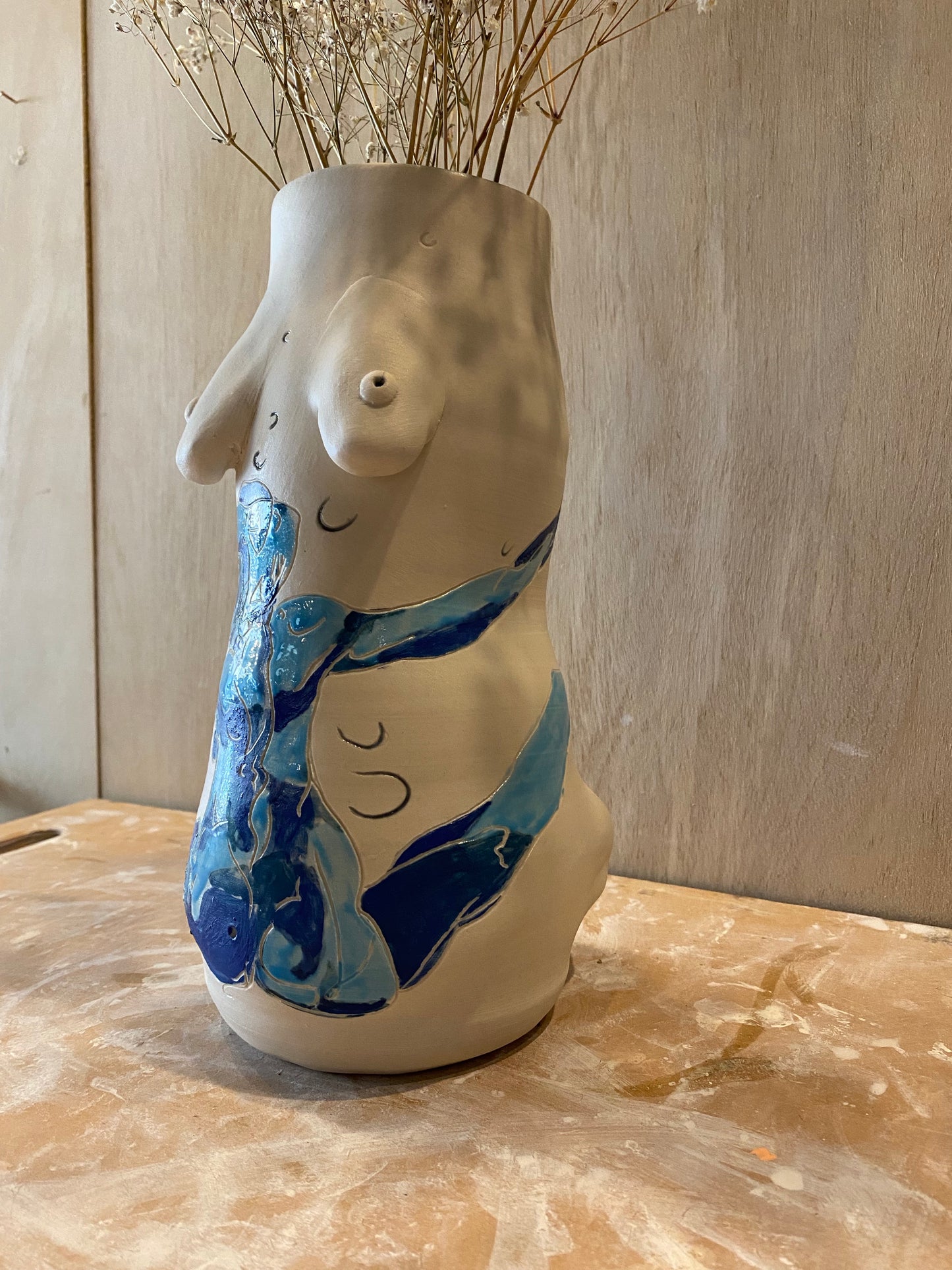 full body vase.