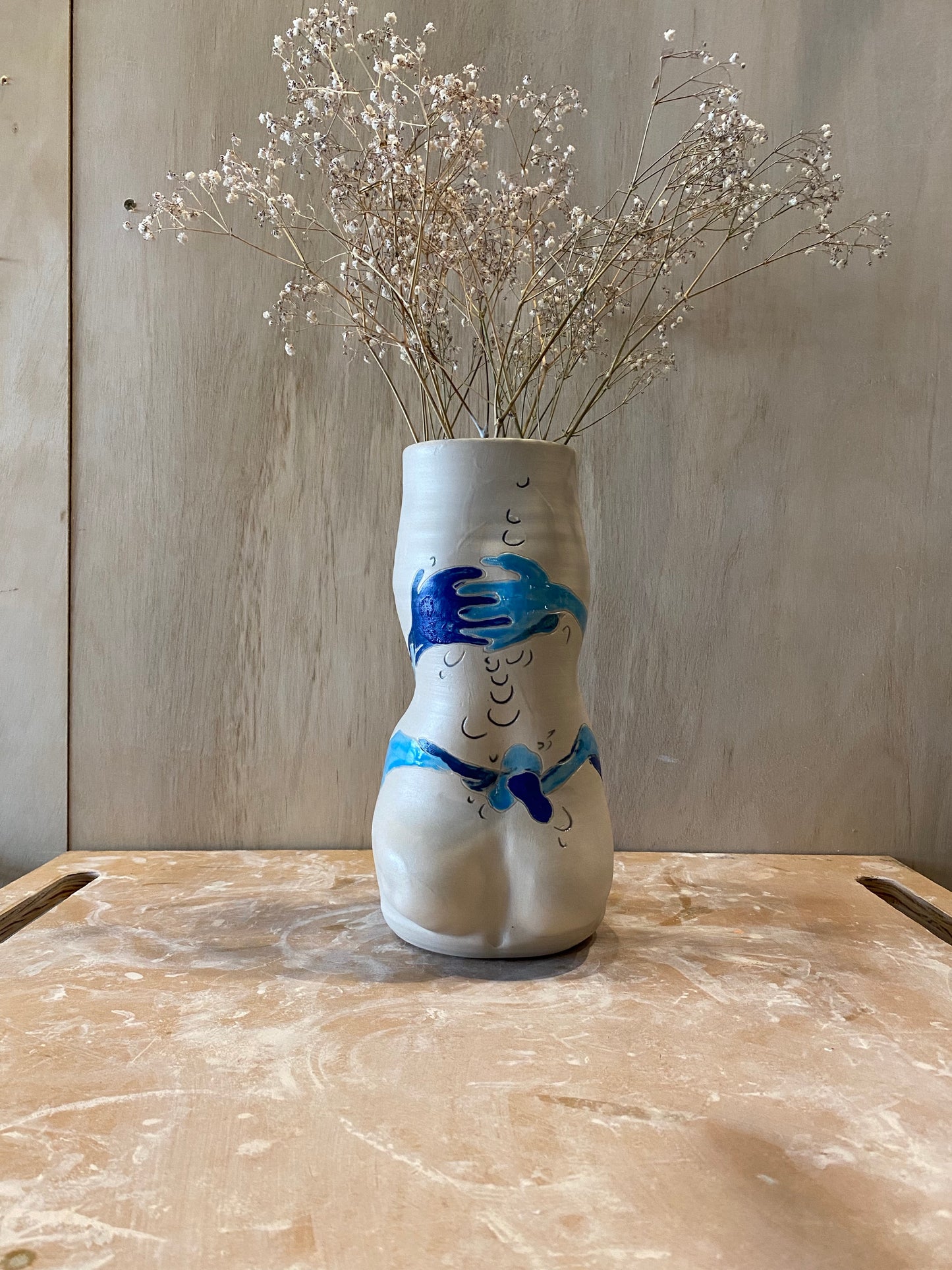 full body vase.