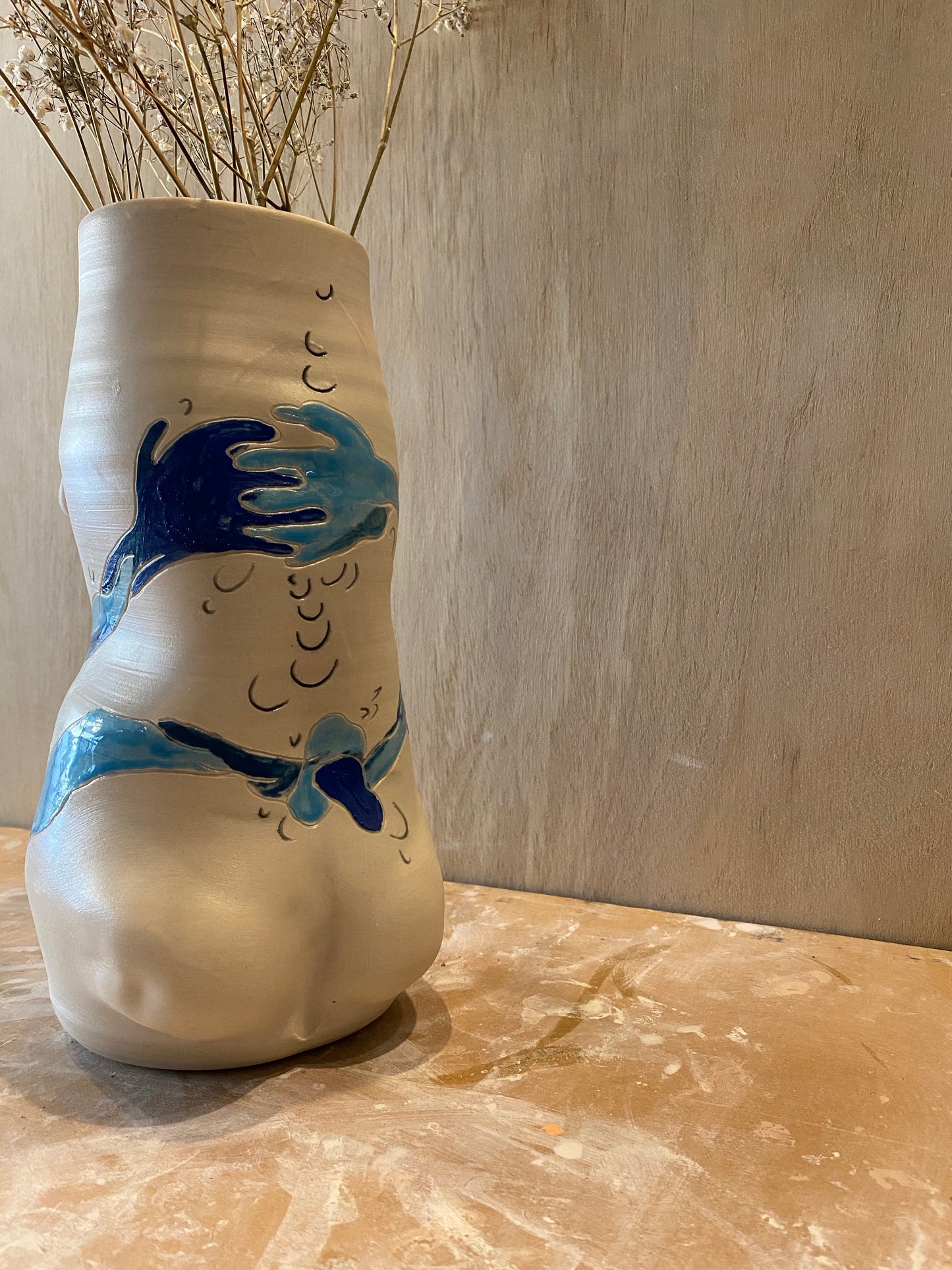 full body vase.