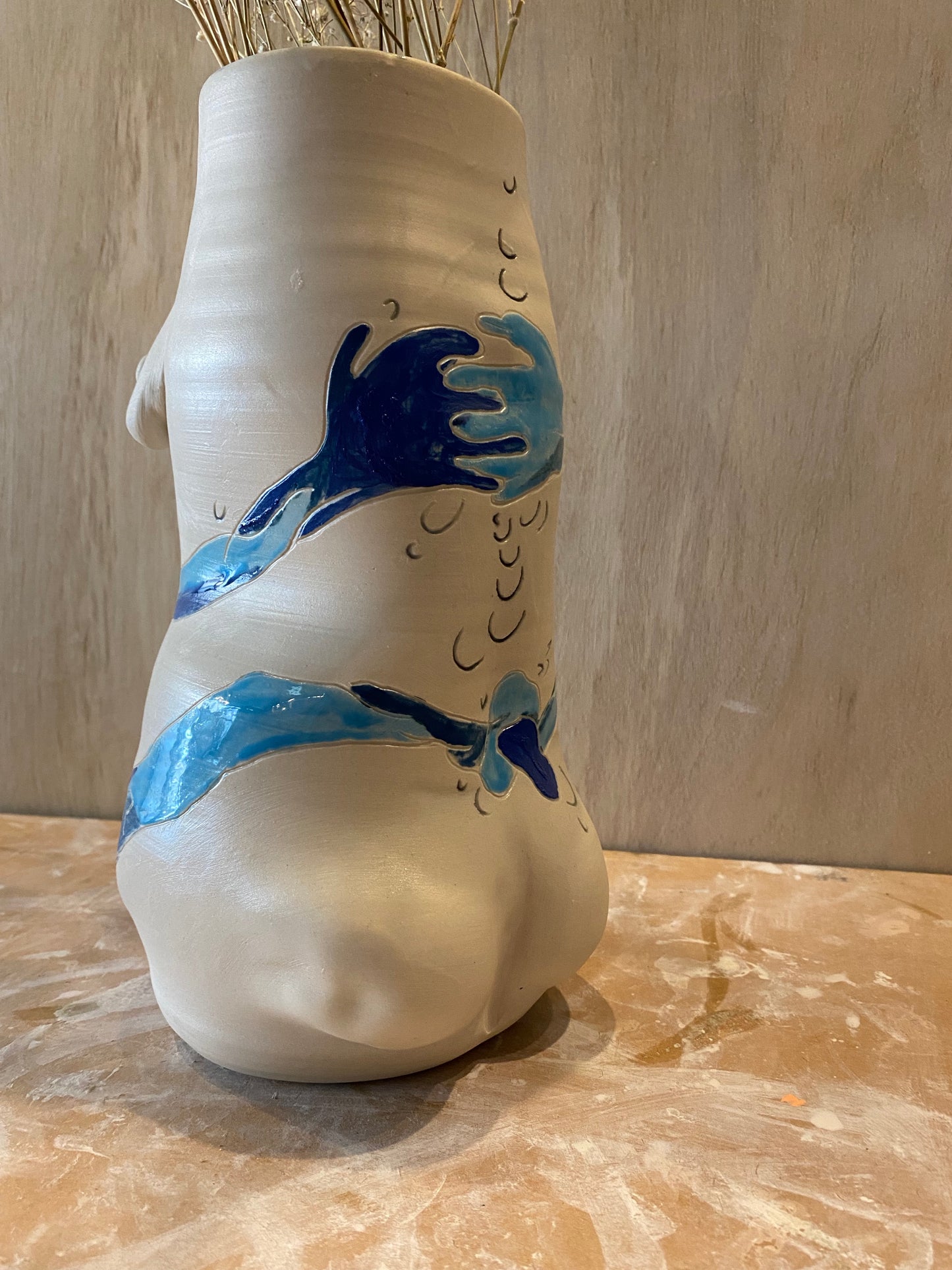 full body vase.