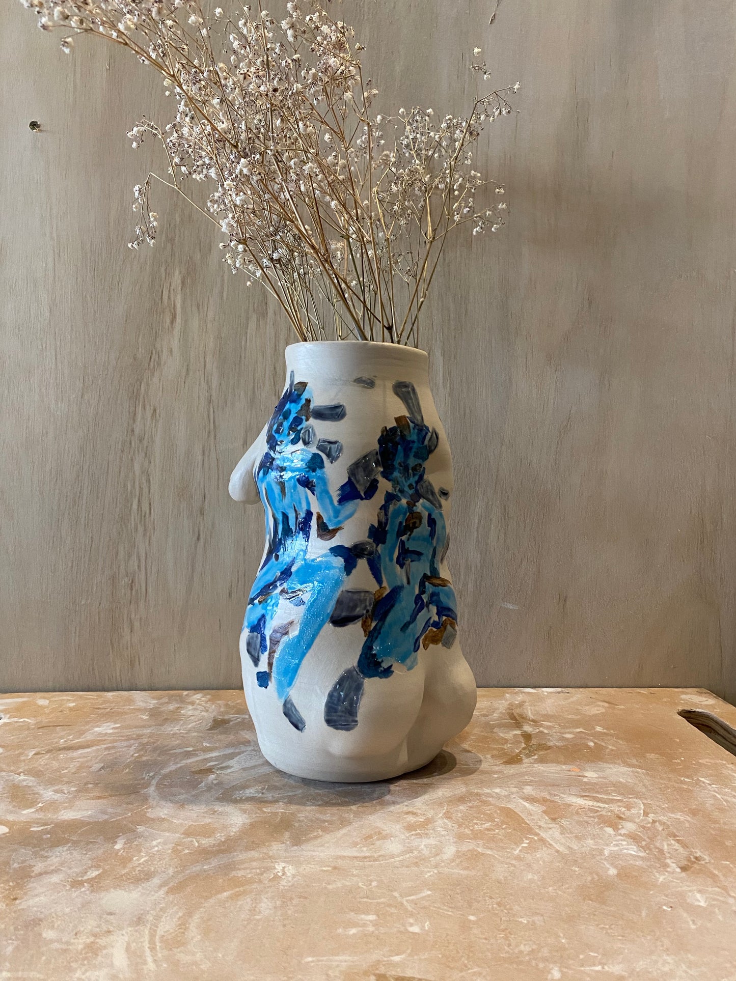 full body vase.