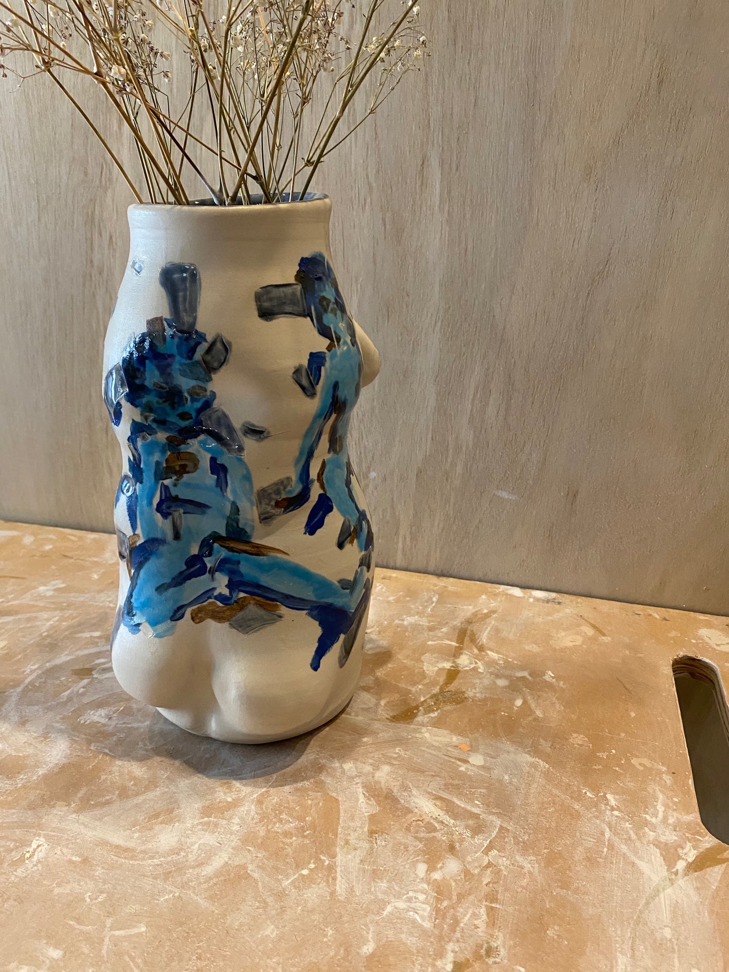 full body vase.